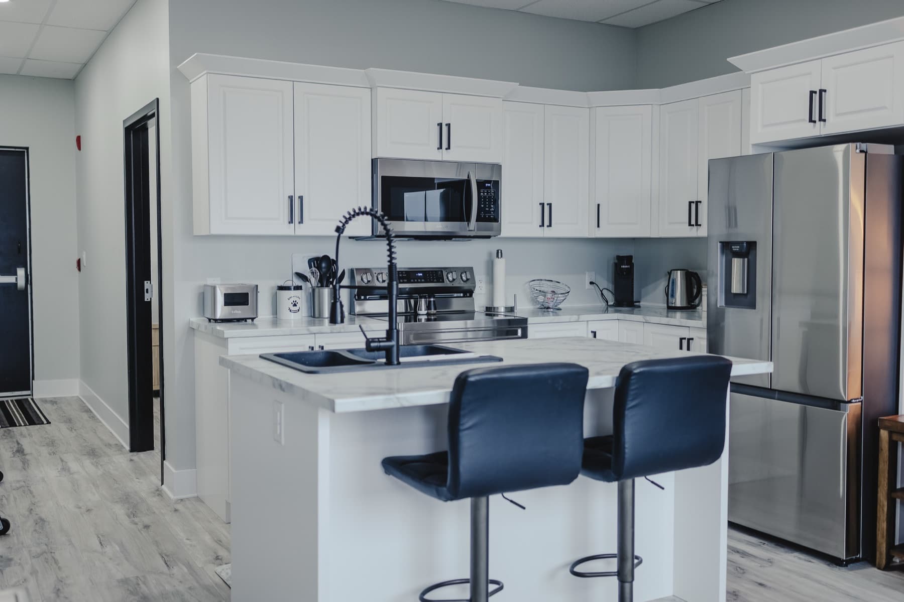 Falkenberg Suites suite kitchen with island seating