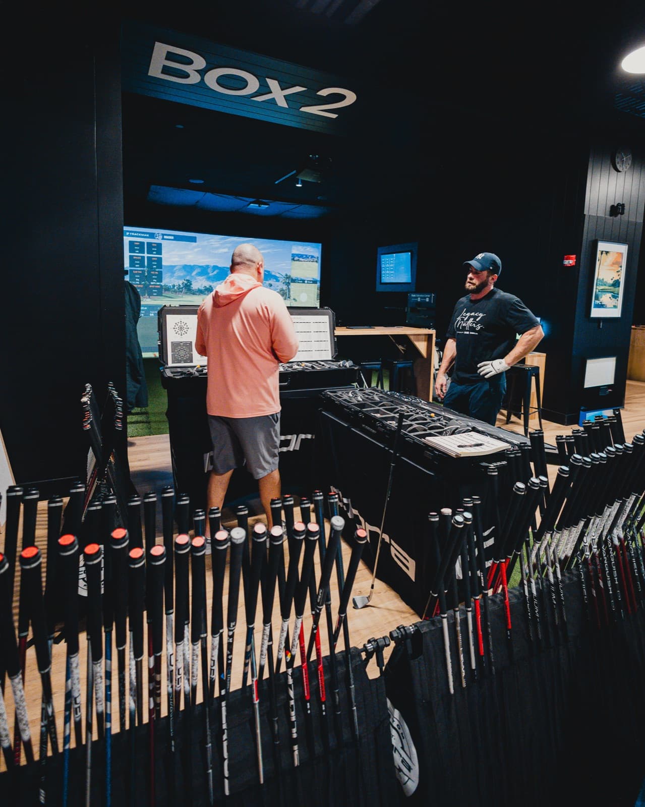 A club fitting underway in a Clubhouse 24/7 simulator bay